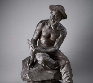 Statue de Jules Mousseron torse nue, habillé en tenue de mineur